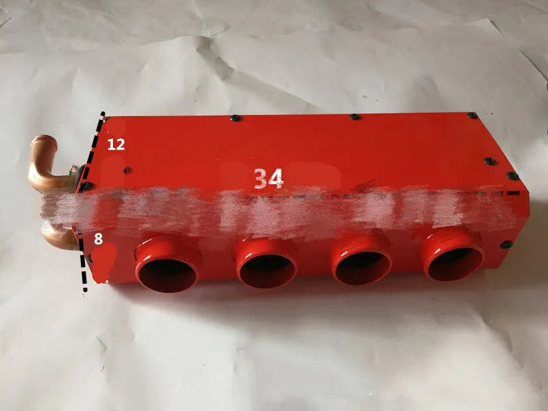 Metal car heater unit with long small four-hole copper pipe for 12V or 24V vehicle installation.