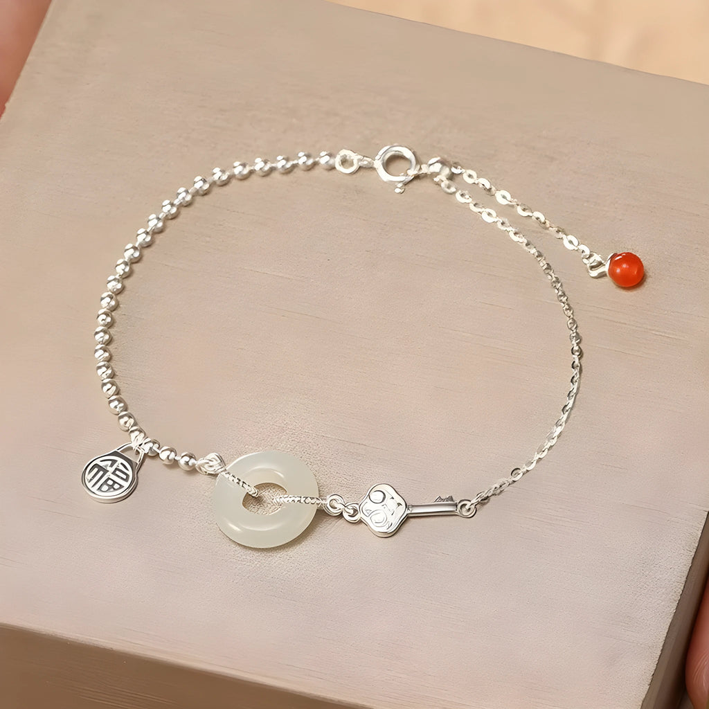 Silver Hetian jade bracelet with blessing card and peace buckle design in geometric Chinese style