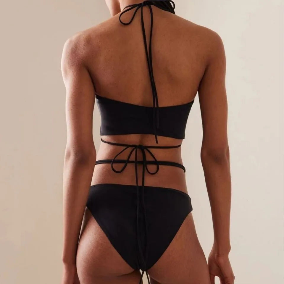 Women's split lace-up bikini swimsuit in black with quick-drying nylon and polyester lining, front view