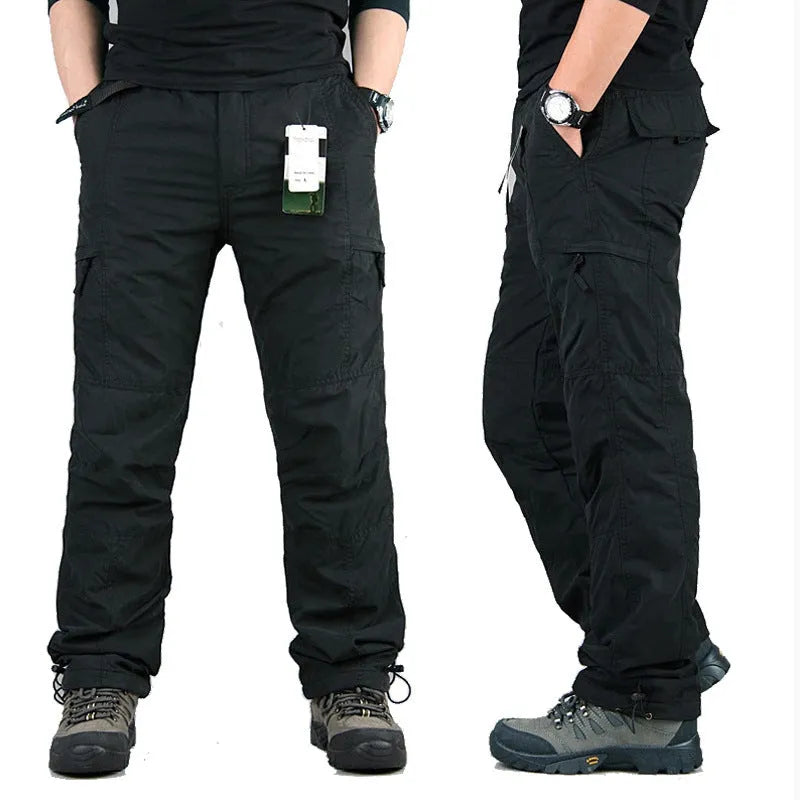 Men's stone-washed khaki cotton work overalls with a wool lining, shown with a loose straight-leg fit.