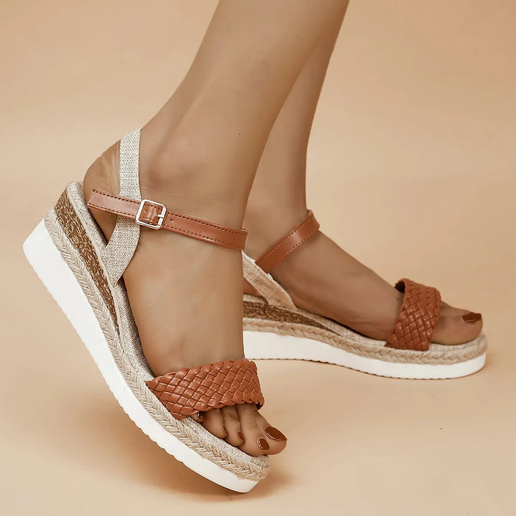 Women's thick-soled braided wedge sandals with buckle fastening, round toe, black colour option