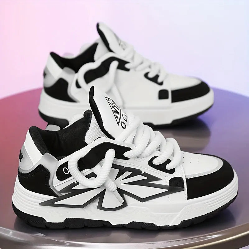 Men's white chunky platform sneakers with thick rubber sole and cartoon pattern on synthetic leather upper.