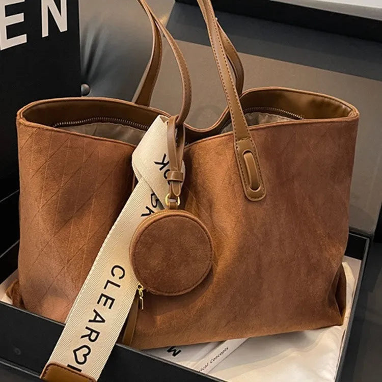 Soft polyester large tote shoulder bag in horizontal square shape with zippered pocket.