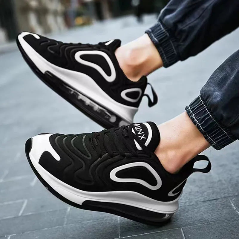 Men's black casual sneakers with a thick sole and lace-up design for running and sports.