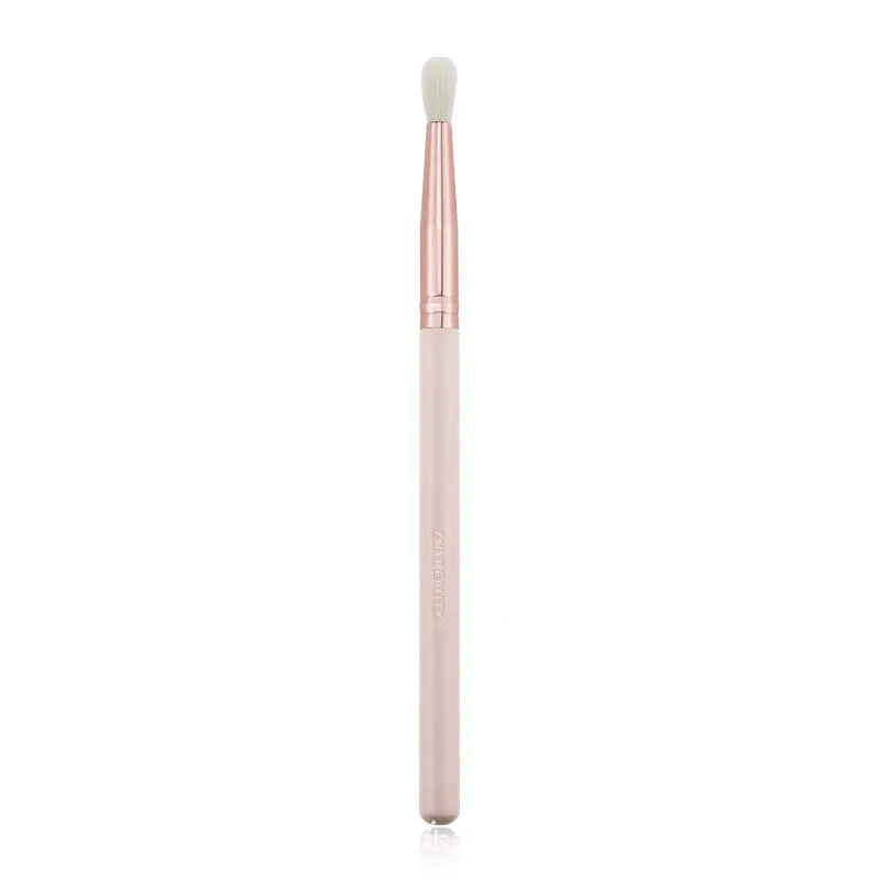 26 pink makeup brushes with wooden handles displayed in a open pink PU travel case
