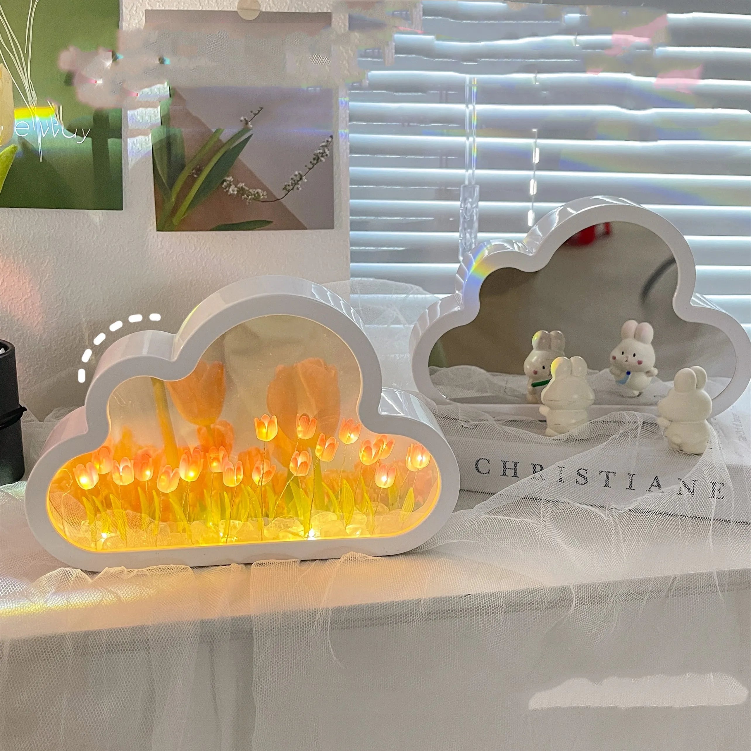 Tulip night lamp DIY kit with pink tulip LED light and mirror surface on a wooden desk