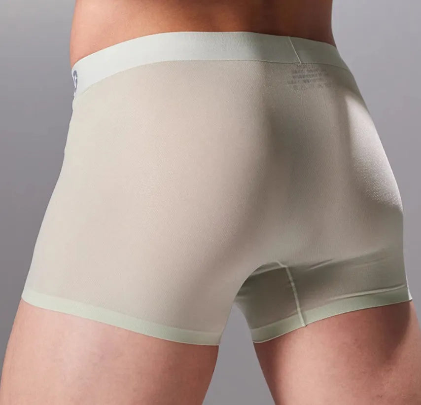 Men's lightweight seamless fitness shorts in black, shown flat, highlighting the antibacterial crotch panel and lack of seams.