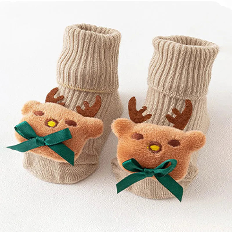 Cotton baby floor socks in multiple patterns including blue bow and lion designs