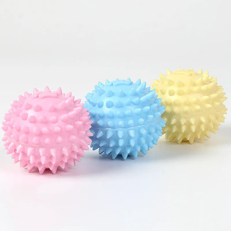 Blue TPR rubber dog chewing ball with textured footprint pattern for tooth cleaning