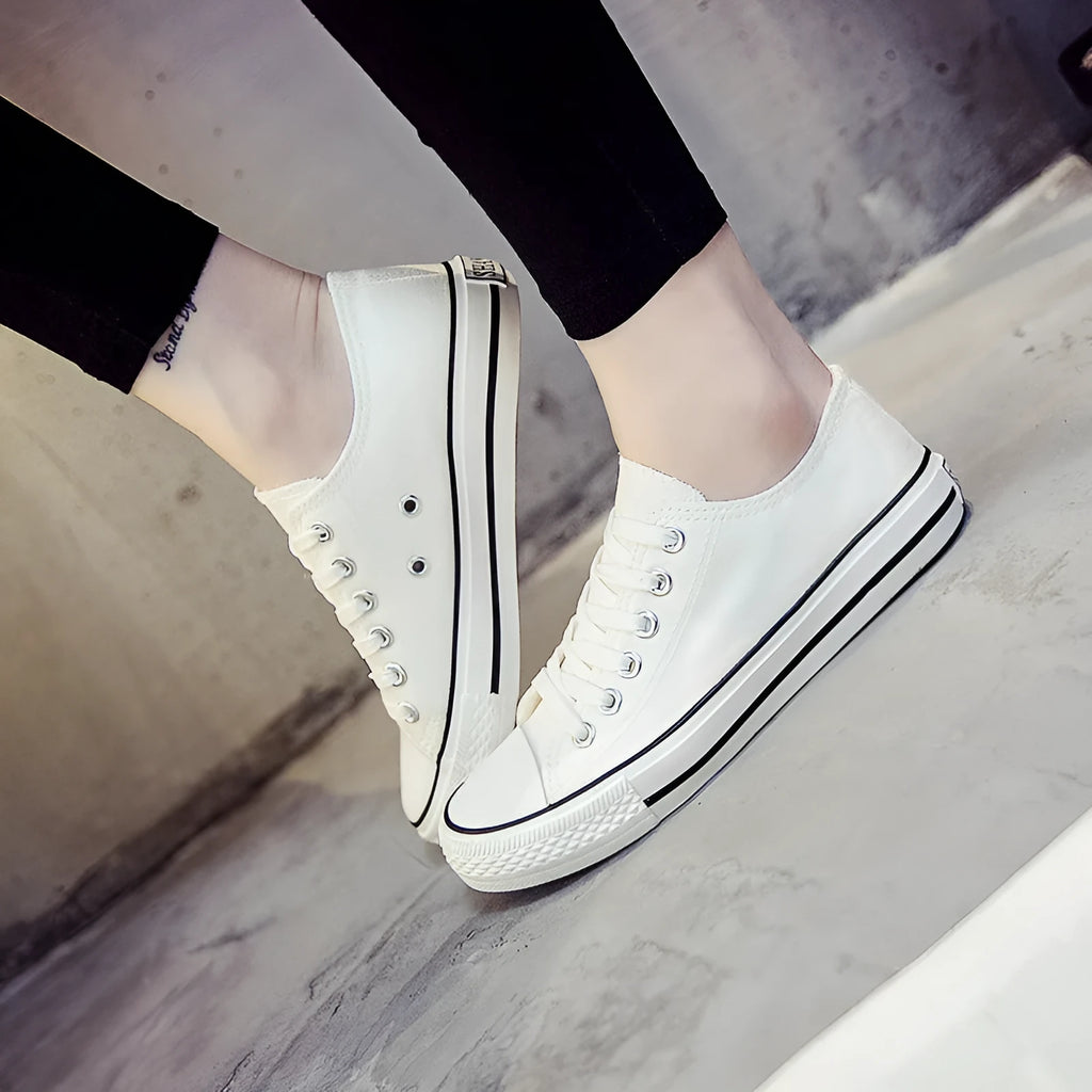 Solid colour women's canvas shoes for summer casual wear on a light background.