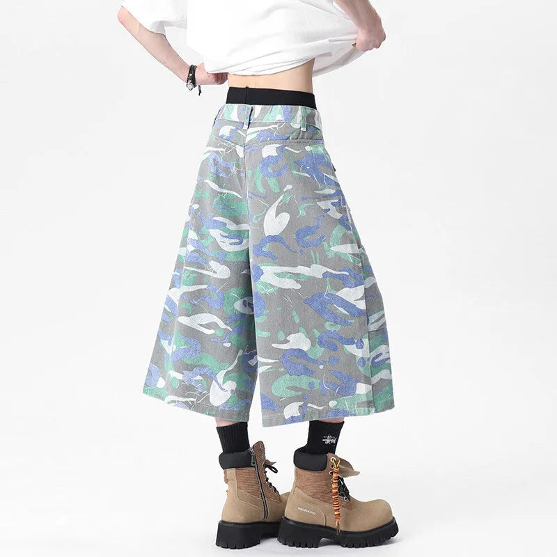 Men's camouflage cotton work trousers with straight leg and cropped length showing utility pockets