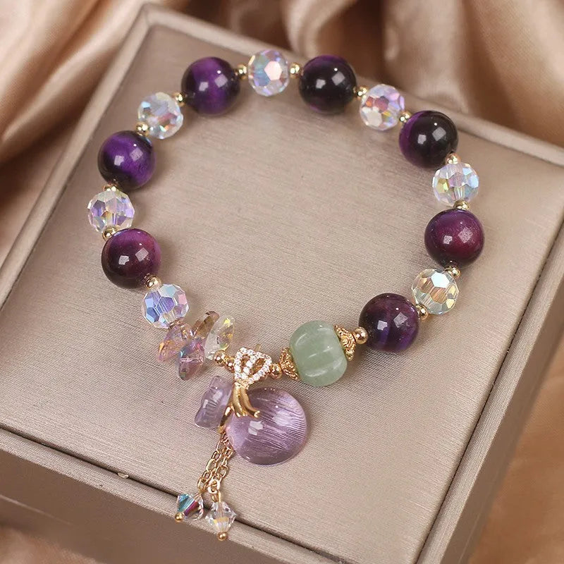 Women's retro transport bracelet with purple tigereye pendant, crystal and rhinestone accents