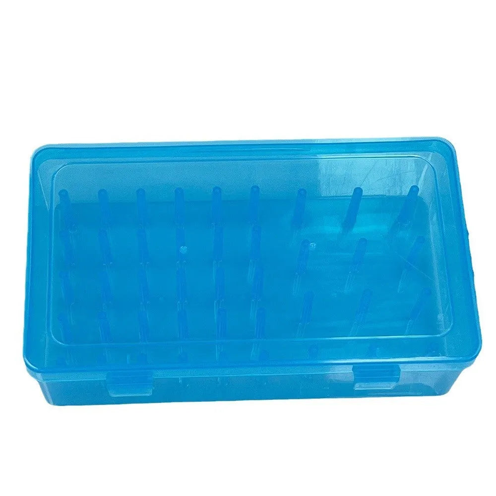 Transparent plastic box with 42 small compartments for organising sewing needles and pins.