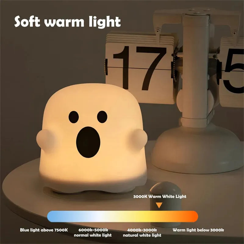 Silicone night light LED touch sensor lamp for kids bedroom in pink, showing soft glow on a bedside table