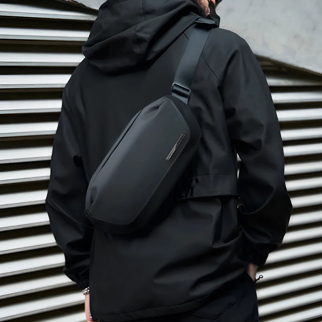 Black Oxford cloth men's messenger bag with one-shoulder riding crossbody design and polyester lining