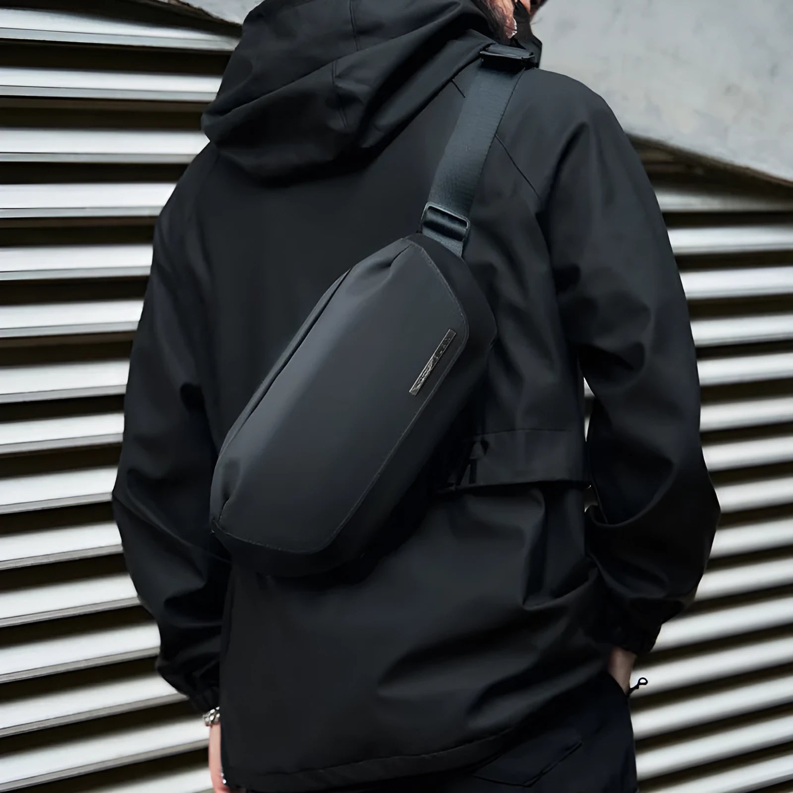 Black Oxford cloth men's messenger bag with one-shoulder riding crossbody design and polyester lining