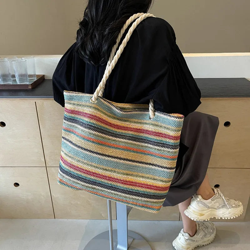 Blue woven nylon shoulder bag with large capacity and a single strap