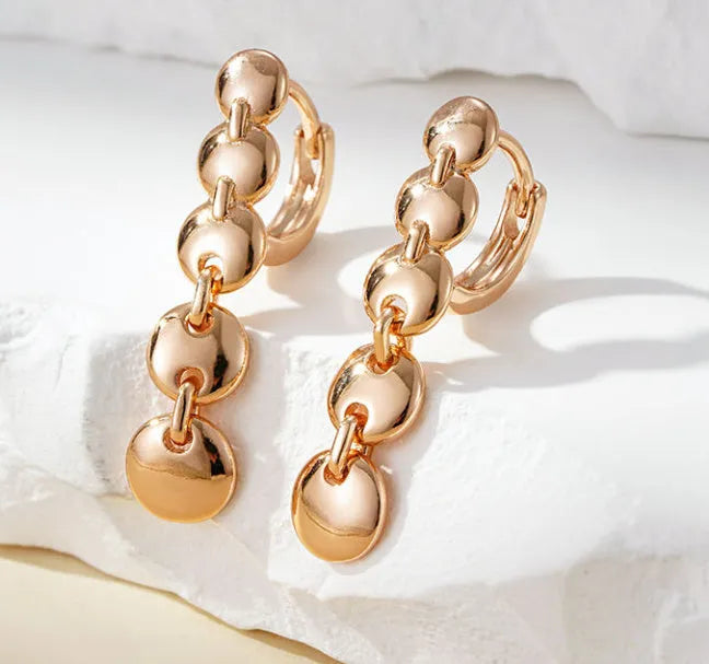 Retro long round circle earrings in woven copper with gold finish