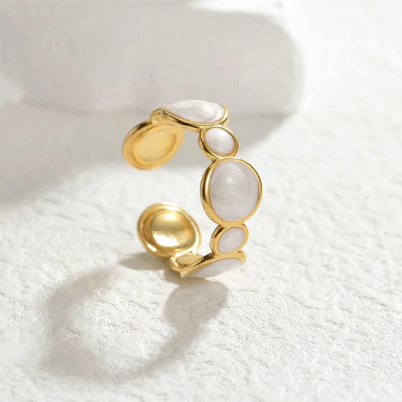Adjustable opening geometric ring in stainless steel with electroplated finish, contemporary jewellery design