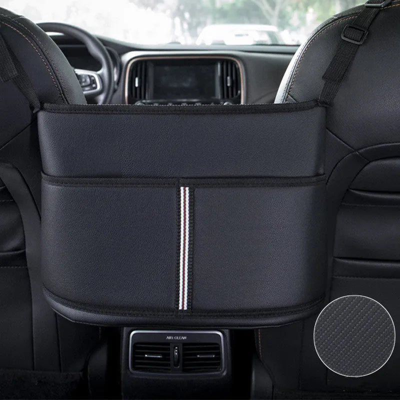 Black leather car seat gap storage bag with a carbon fibre pattern, shown in a vehicle.