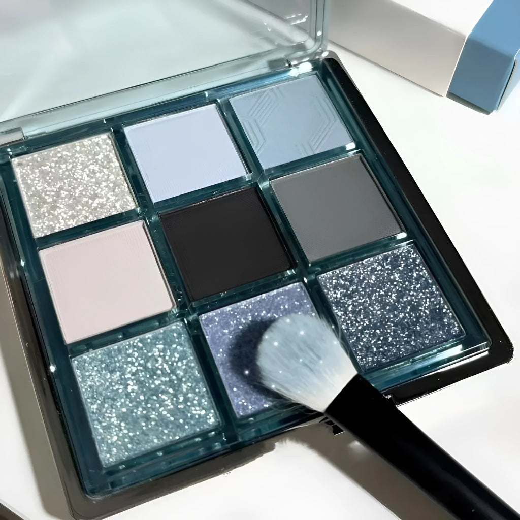 MUGELEEN nine-colour eye shadow palette showing blue smokey shades with matte and shimmer finishes