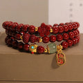Polished cinnabar gourd five petal flower bracelet 6mm multi-circle on display
