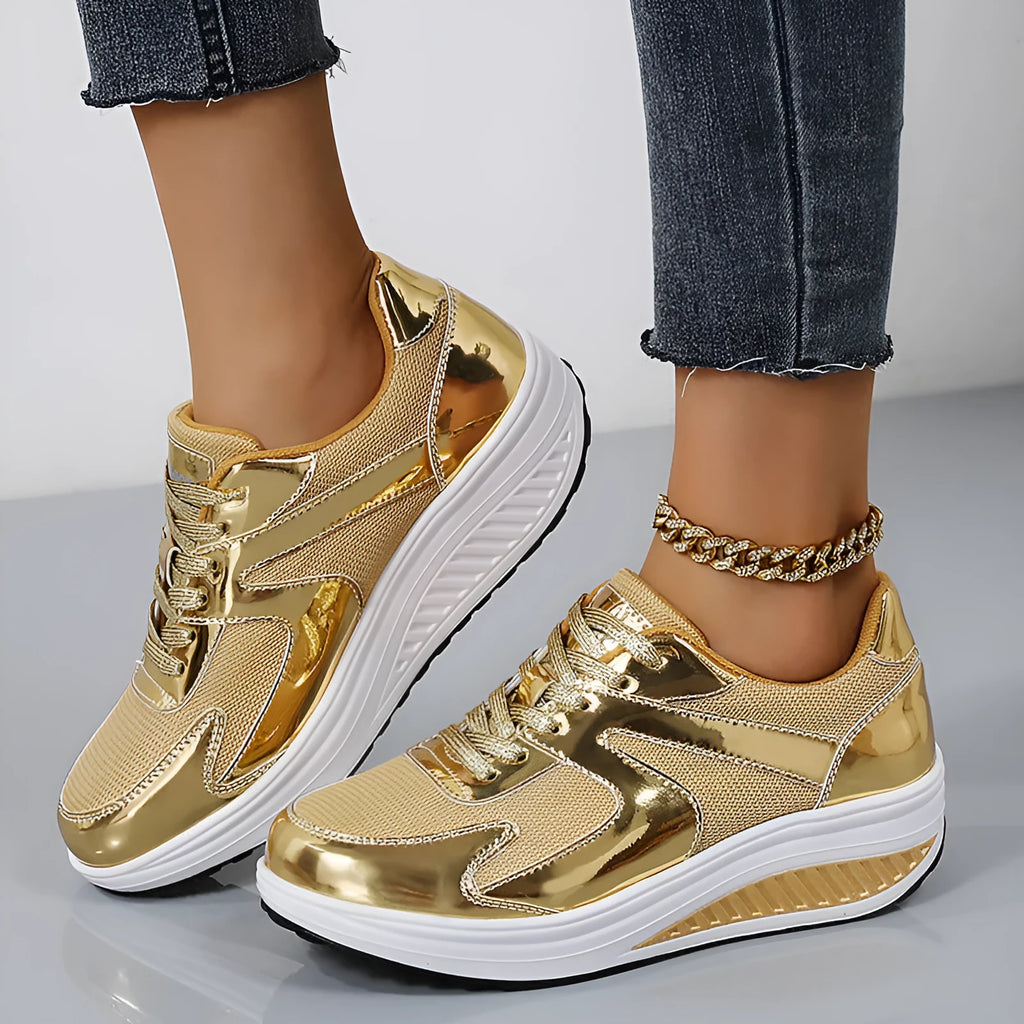 Women's gold breathable mesh elevator sneakers with thick platform sole, cross strap, and round toe