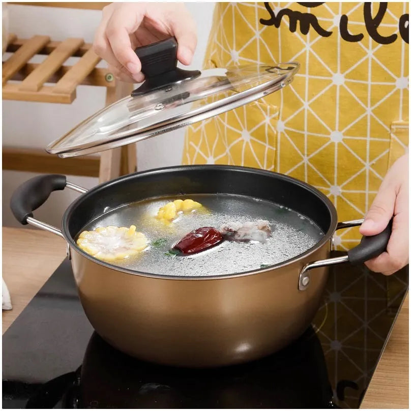 Three-piece cast iron non-stick cookware set with soup pot, milk pot, and wok in light luxury style