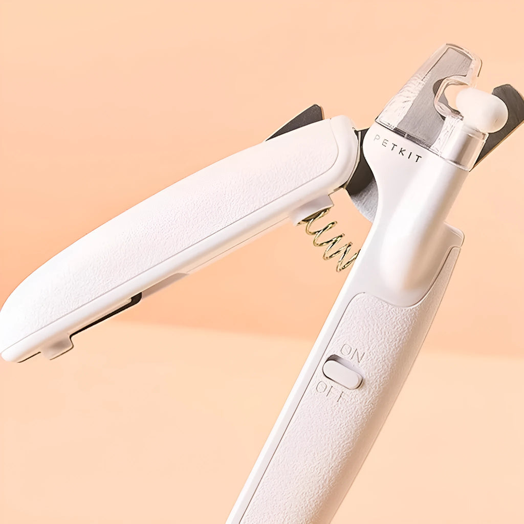 White pet nail clippers with LED light, transparent anti-splash guard, and a leather-like handle.