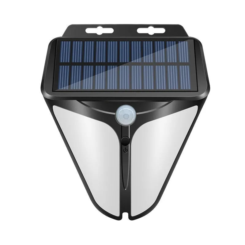 Heart-shaped human induction solar wall lamp mounted on wall with warm light glow