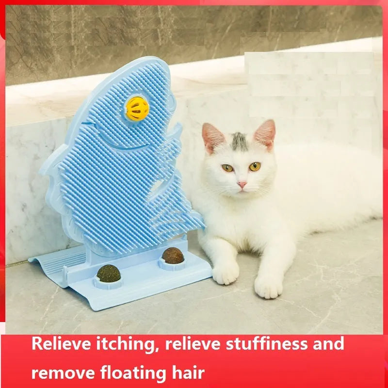 Blue fish-shaped cat wall scratcher with self-grooming brush and two green catnip balls on a base