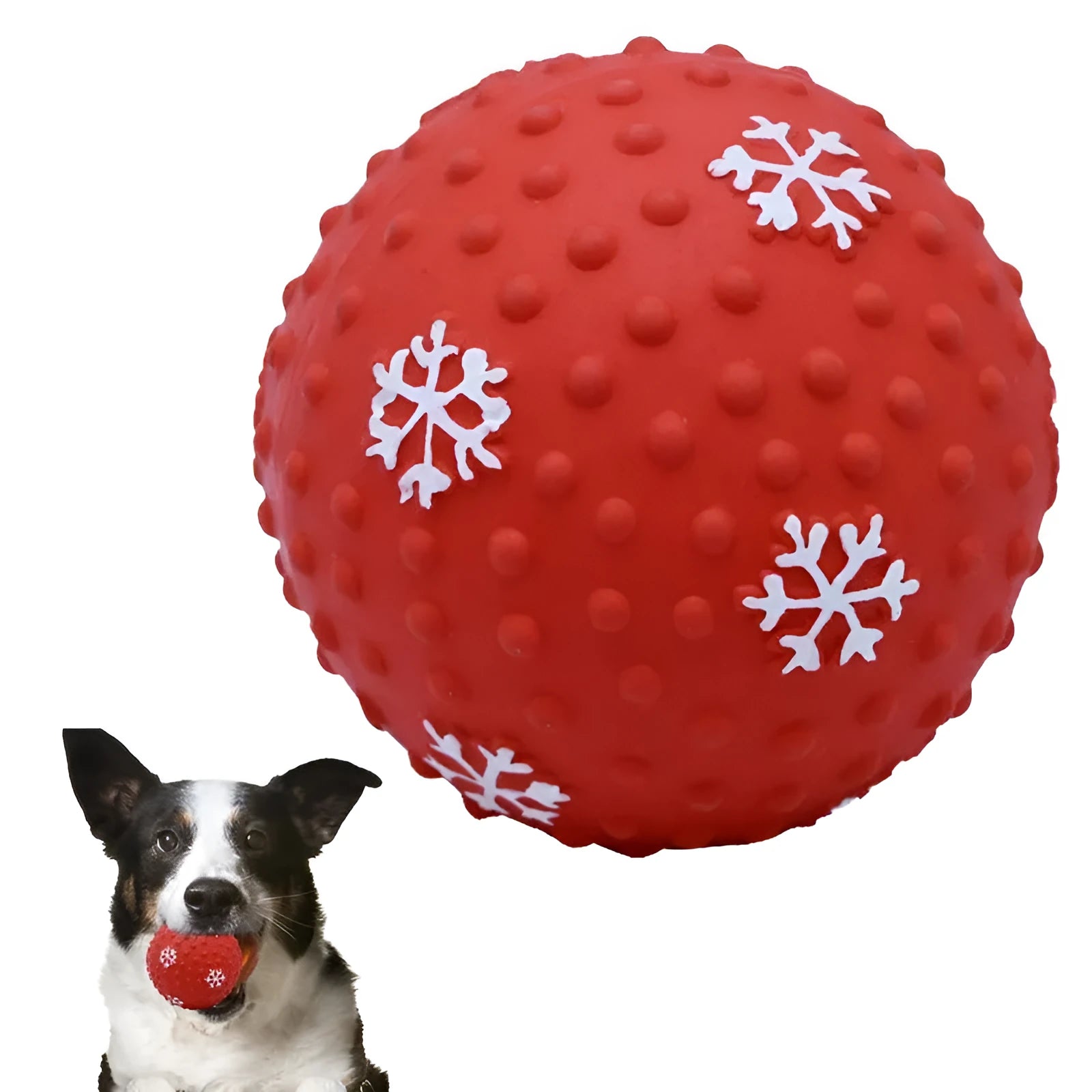 Red dog toy ball with snowflake print pattern, 7cm diameter, bouncing on grass