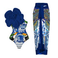 Form-fitting one-piece swimsuit with three-dimensional floral decoration on solid colour fabric.