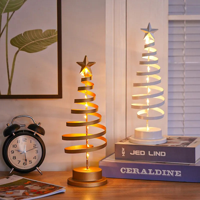 LED Christmas tree spiral light ornament in iron, golden finish, 33cm tall, warm white glow on a tabletop