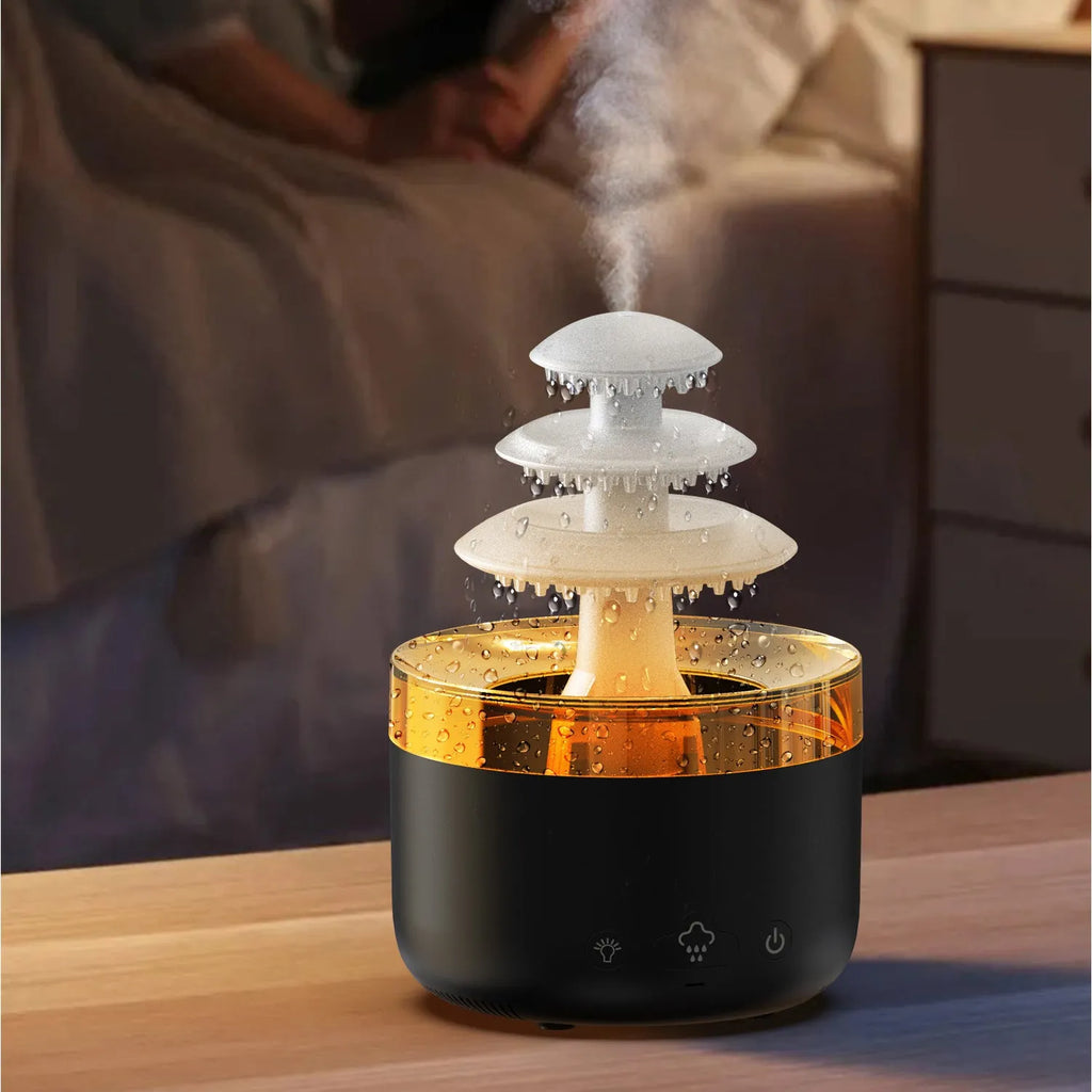 White plastic New Cloud Rain Air Humidifier with 500ml water tank and 7-colour atmosphere light on a wooden desk