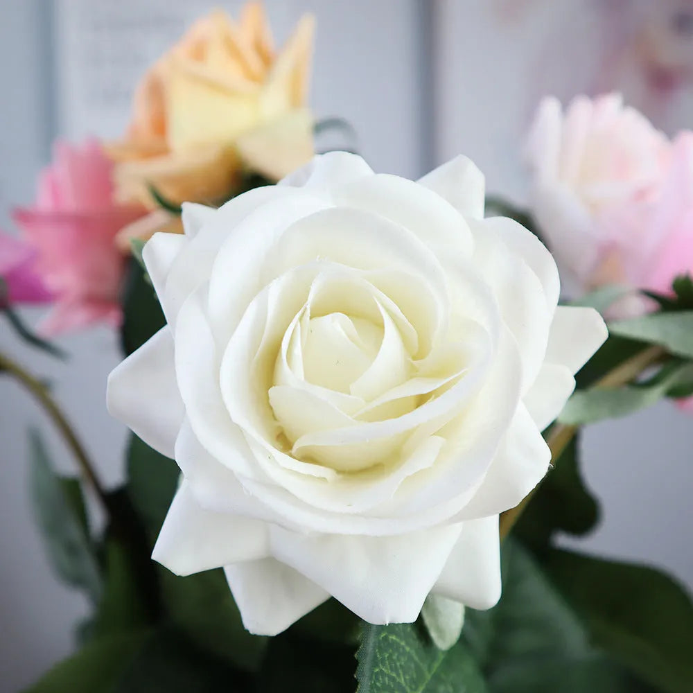 Artificial silk flower bouquet measuring approximately 42cm long with 8.5cm flower heads in multiple colour options