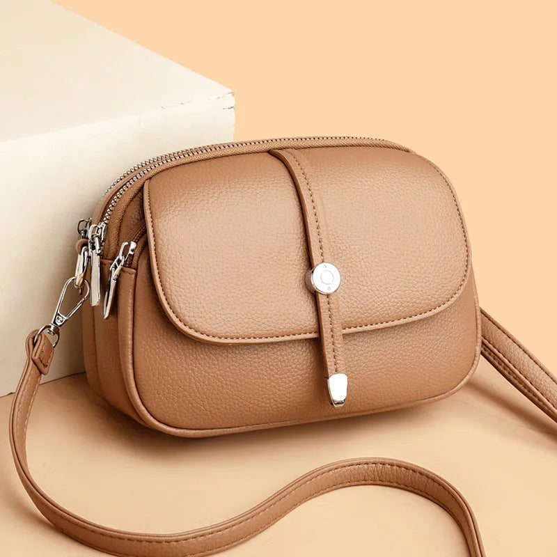 City Simple women's soft PU oval crossbody shoulder bag with sewing thread detail in Black 2545