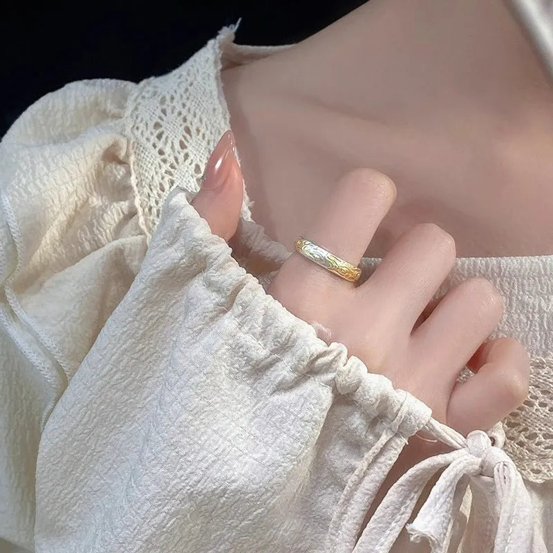 Xiangyun pattern open mouth ring with electroplated silver gold finish showing geometric fairy-style design