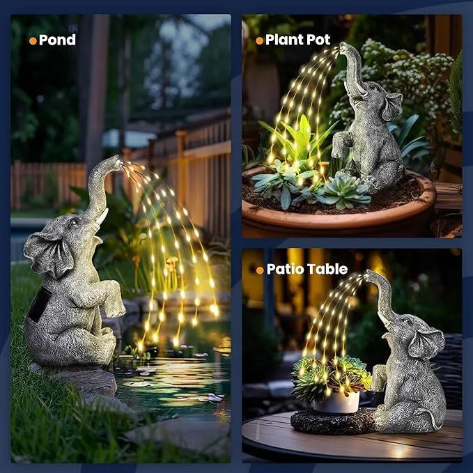 Outdoor resin elephant statue sculpture with LED light strip on garden lawn.