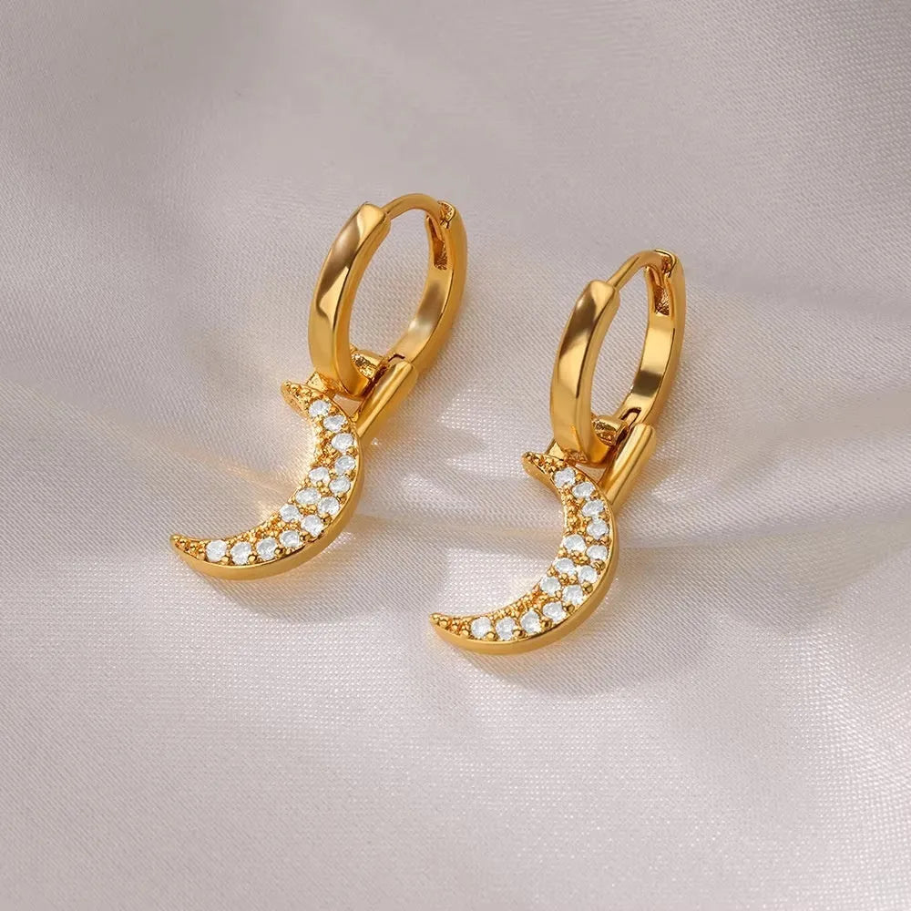 Copper butterfly earrings with irregular geometric design combining heart, bow and star shapes in diamond colour treatment