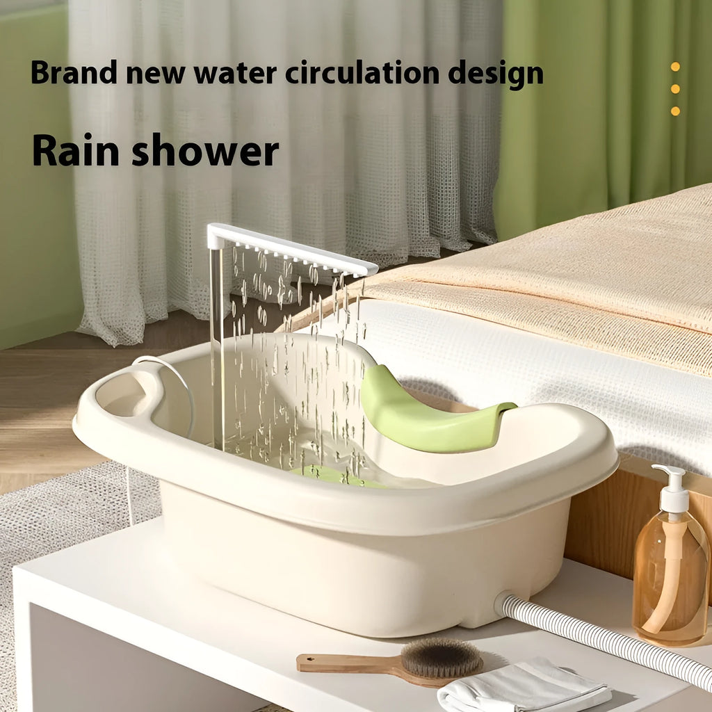 Portable plastic bed shampoo basin set with head pillow, water pump, and accessories in light pink colour.