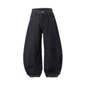 Men's original cow colour wide-leg denim trousers laid flat, showing mid-waist and full-length legs.