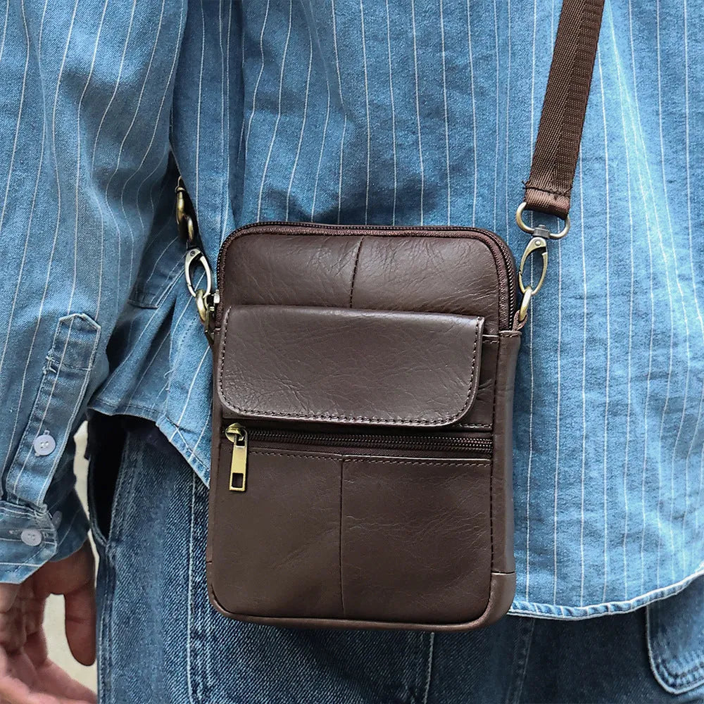 Men's brown genuine leather crossbody shoulder bag with visible stitching.