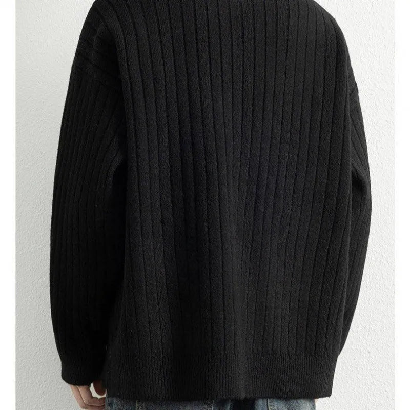 Men's grey half zip loose fit texture knitted sweater on a hanger.