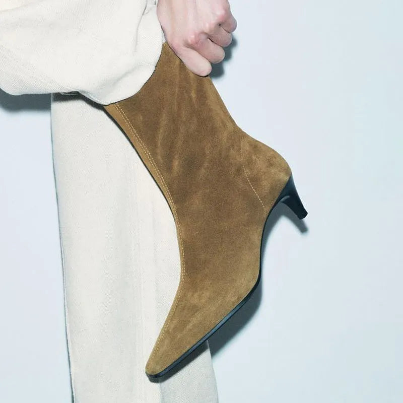 Brown women's square toe mid-calf boots with a side zipper and a low kitten heel on a waterproof platform sole.