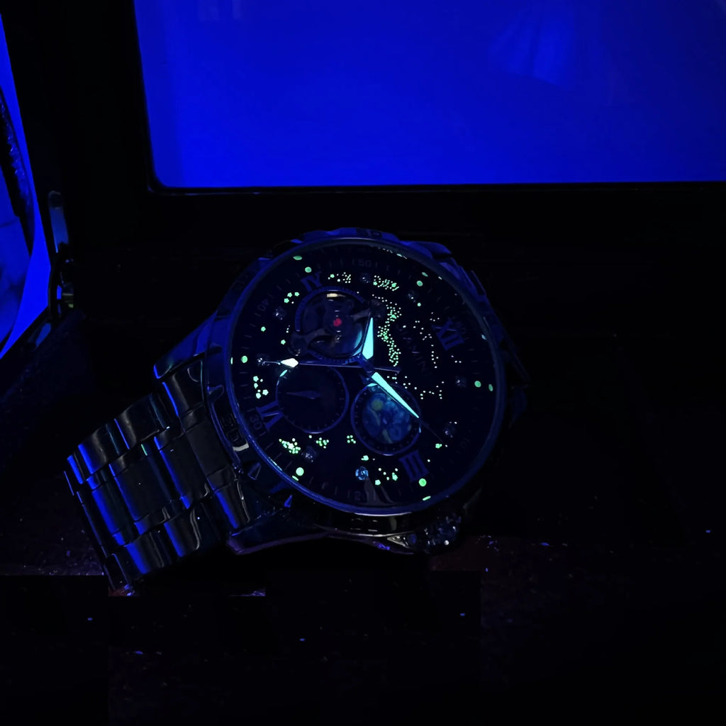 Men's automatic mechanical watch with rose gold shell and black dial showing 42mm diameter