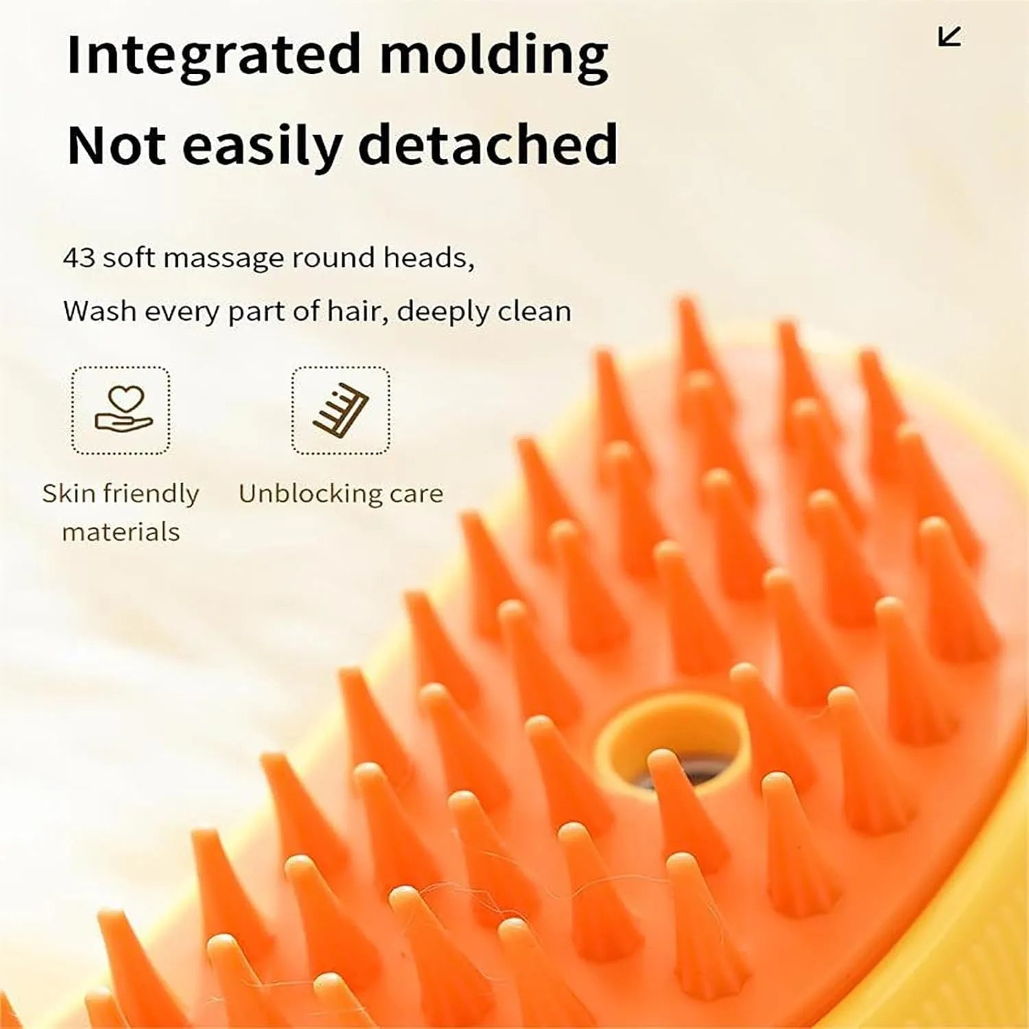 Green and yellow rechargeable steam cat brush with silicone paw-shaped bristles on a white background.