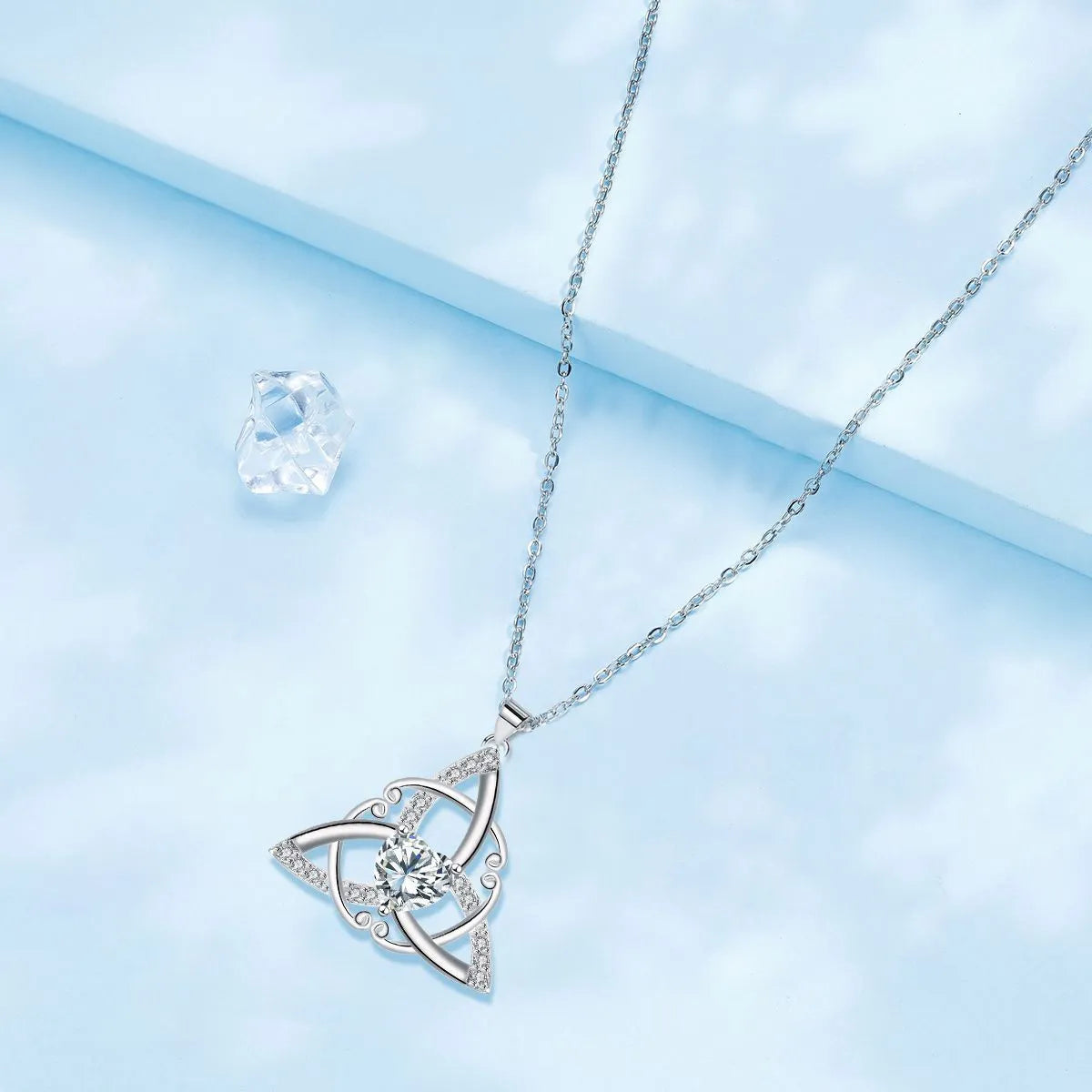 Copper Celtic knot necklace with geometric pendant design in choice of four electroplated colours