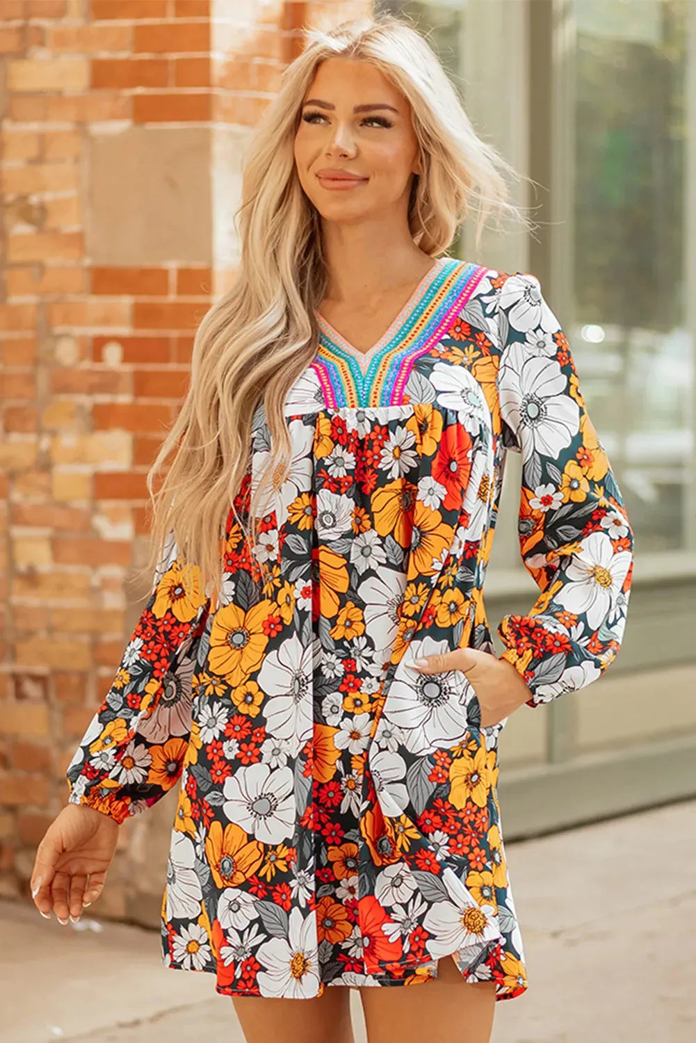 Orange floral print women's dress with striped lace sleeves and hem, V-neck long sleeve design.