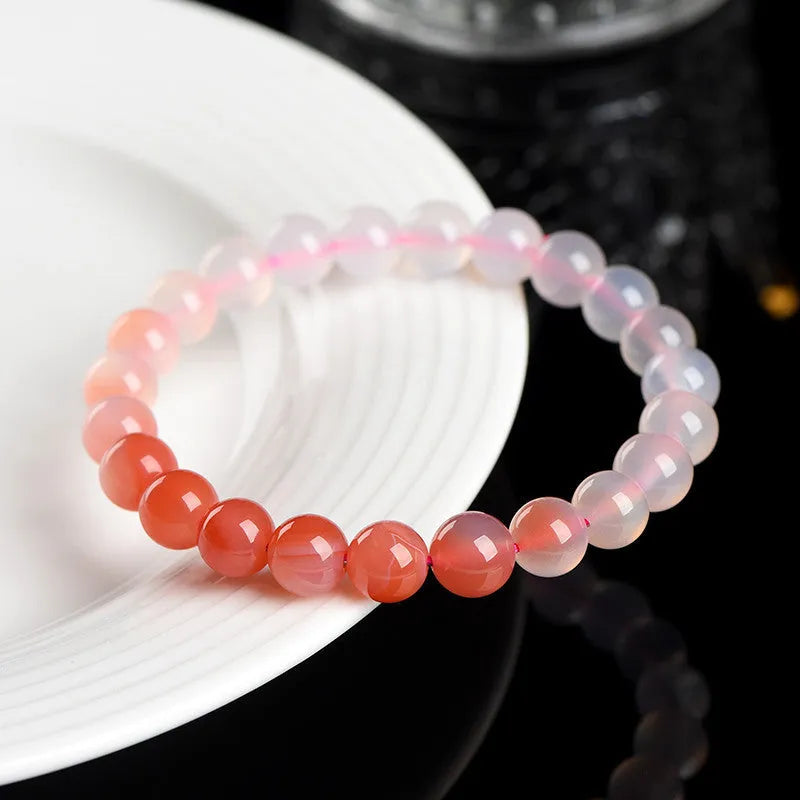 Natural gradient Yanyuan agate bracelet in a unisex geometry style on a wrist.